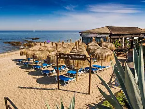 Malaga Prints: Villa Tropicana Chiringuito, beach restaurant and umbrellas