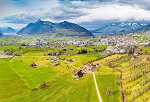 Holiday House Prints: Village in Switzerland. Canton of Schwyz. Panorama aerial view from a drone
