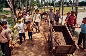 Village Life Prints: Villagers on their village road between rice paddies, North Vietnam, June 1980