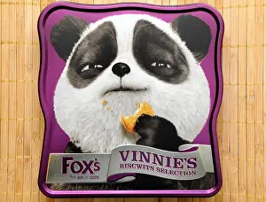 Promotional Prints: Vinnie the panda character used on the lid of fox's biscuit selection