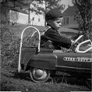 Retro Style Prints: Vintage 1950s Murray City Fire Department Fire Truck Pedal Car with boy