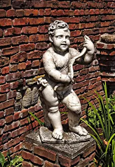 Angelic Prints: vintage cherub like garden statue