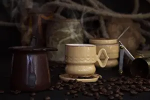 Caffeine Prints: Vintage Coffee Cup, Pot, Grinder With Coffee Beans On a Rustic Wooden Surface