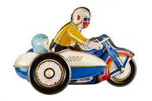 Sidecar Prints: Vintage motorcycle with sidecar metal toy isolated on a white background