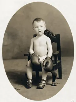 Ancestor Prints: Vintage Photo of Small Child Wearing Boxing Gloves