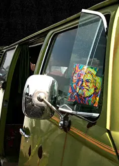Hippie Prints: Vintage rusting green VW bus with psychedelic Jerry Garcia stencil on wing window