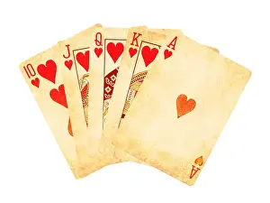 Flush Prints: Vintage worn out hearts royal flush poker cards isolated on white