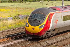 Virgin trains high speed Pendolino at Winwick junction on the West Coast main line. WCML