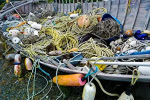 Navigate Prints: A virtual outdoor museum of fishing and boating gear adorn a property on the Homer Spit