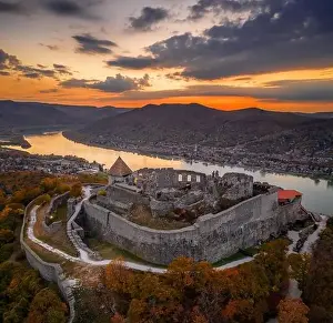 High Hill Prints: Visegrad, Hungary - Aerial panoramic drone view of the beautiful high castle of Visegrad with autumn foliage and trees