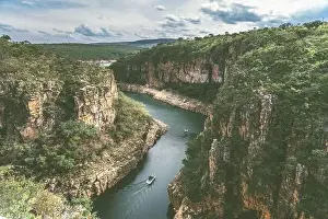Minas Gerais Prints: Visitors boats cruising through the canyons of Capitolio in the Serra da Canastra National Park in Brazil