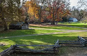Appalachian Prints: Visitors explore historic buildings at Cades Cove in the Great Smoky Mountains National Park