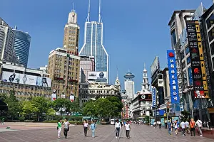 Clothing Store Prints: Visitors at Nanjing Road. Main shopping street of Shanghai