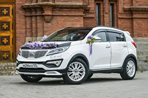 Showroom Prints: Vladivostok, Russia, July 16, 2016 Kia Sportage white is on the road near the house in Vladivostok on 16 July 2016