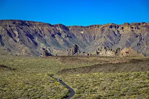 Tenerife Prints: volcanic rocky mountains on the island of Tenerife and a tiny bus inside