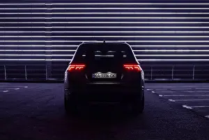 Cyberpunk Prints: Volkswagen Tiguan on dark city street at night - dark silhouette