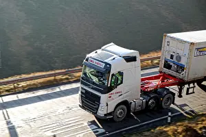 Moorland Prints: Volvo truck pulling a container trailer climbs the Woodhead PAss on the Yorkshire side
