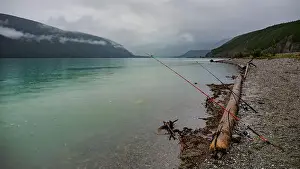 Water Resources Prints: Waiting for a bite in the rain at Muncho Lake, British Columbia, Canada