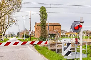 Semaphore Prints: waiting for the passage of the train at a country railway crossing