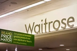 Branded Prints: Waitrose and their Brand Price Match promise sign display in store, UK