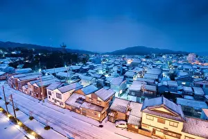 Okunoto Prints: Wajima, Ishikawa, Japan town skyline in winter at twilight