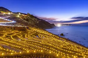 Wajima, Japan at Shiroyone Senmaida rice terraces during a winter light up