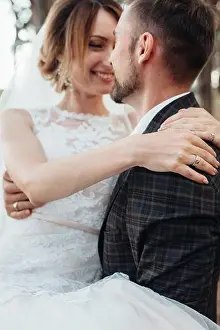 Forever Prints: walk of the bride and groom through the autumn forest in October