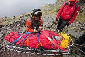 Hill Mountain Prints: A walker with a compound leg fracture is treated by Langdale Ambleside Mountain Rescue Team in Easy Gully on Pavey Ark
