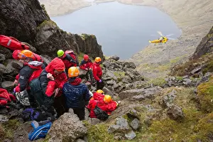 Injured Prints: A walker with a compound leg fracture is treated by Langdale Ambleside Mountain Rescue Team in Easy Gully on Pavey Ark