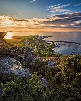 Scenics Nature Prints: Warm sun setting over Alnes on Godøy, Norway