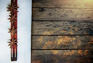 Cardamom Prints: Warming spices - Star anise with wooden chopsticks on vintage wood table