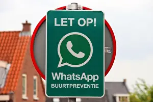 Warning sign that neighberhood alert system via Whatsapp is active in the Netherlands