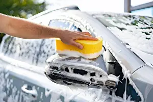 Foam Prints: Washing Car Side Mirror With Sponge