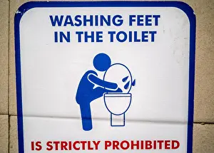 Prohibited Prints: No washing feet in toilet sign, Mumbai, India