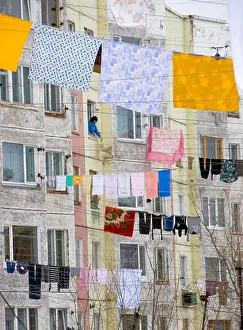 Drying Prints: Washing hanging to dry between apartment buildings in city of Petropavlovsk Kamchatsky in Kamchatka Russian Far East