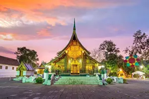 Laos Prints: Wat Xieng Thong, the most popular temple in Luang Pra bang, Laos at sunset