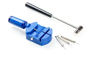 Punch Prints: watch pin remover and pin punch on white background, tool for watch