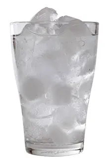 Sparkling Prints: Water in a glass with ice cubes, isolated on white