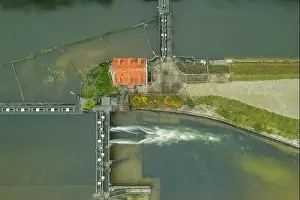 Seen From Above Prints: Water management via a water lock in a river in the german landscape next to munich