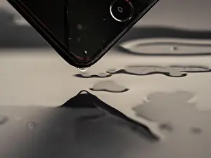 Splashing Prints: Water has been spilled on the Smartphone