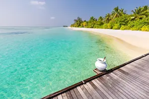 Water villas on tropical island, Maldives. Luxury summer travel and exotic vacation destination