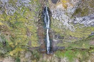 Aerial Landscape Collection: A waterfall flows over a cliff into the Columbia River Gorge in Oregon. This canyon