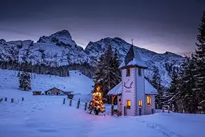 X Mas Prints: Watzmann in winter with small church illuminated for Christmas