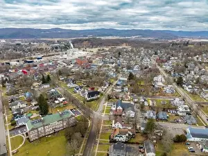 Penn York Valley Prints: Waverly, NY, USA - 03-03-2024 - Cloudy winter aerial image of the downtown area in the Village of Waverly