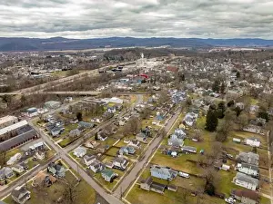 Waverly, NY, USA - 03-03-2024 - Cloudy winter aerial image of the downtown area in the Village of Waverly, NY