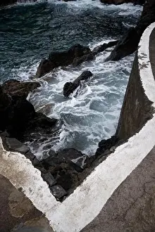 Natural Pools Prints: Waves crash against volcanic rocks beneath a sharp concrete edge at Porto Moniz natural pools