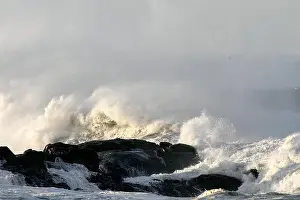 Breaker Prints: Waves against rocks and boulders in a stormy morning in the north of Portugal