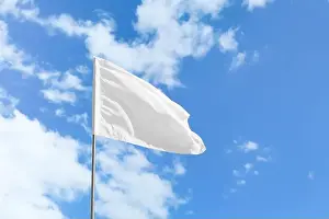Surrender Prints: Waving white flag against blue sky