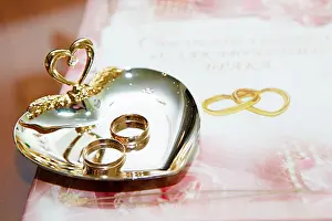 Commitment Prints: wedding rings and marriage certificate to the registration desk