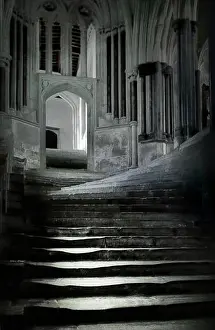 Feet Prints: Wells Cathedral. The time worn Chapter House stone steps known as the Sea of Steps